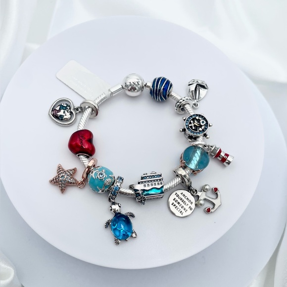 Linx Snake Chain Bracelet with Nautical Themed Charms